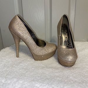 Gold sparkly platform heels